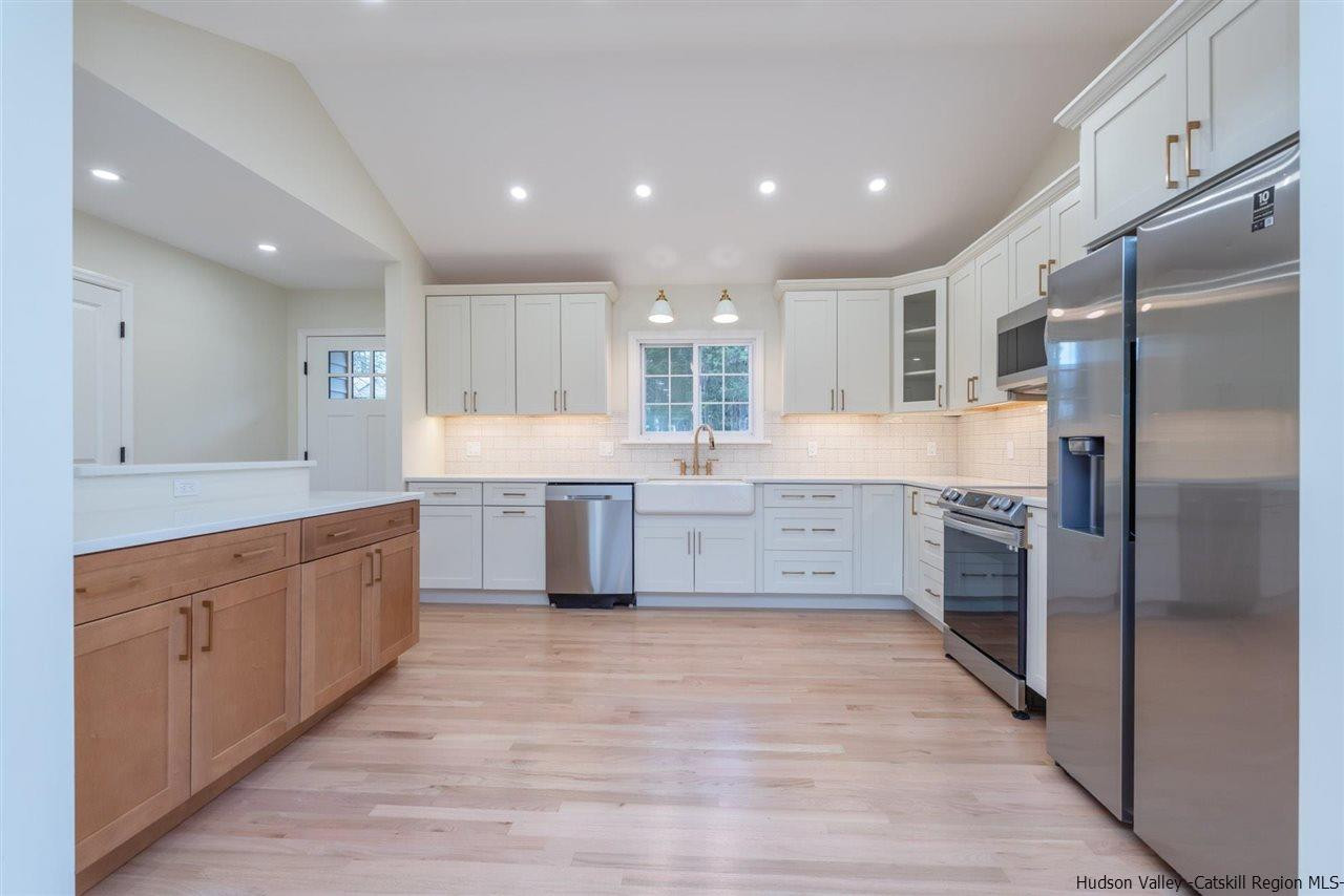 20 Robin Lane Kingston, NY 12401 - Photo 8 of 35 a large kitchen with stainless steel appliances granite countertop a large counter top a sink stainless steel appliances and cabinets