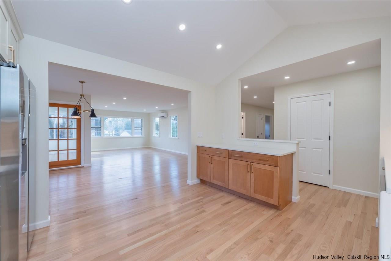 20 Robin Lane Kingston, NY 12401 - Photo 9 of 35 a large kitchen with stainless steel appliances granite countertop a large counter top and a wooden floors