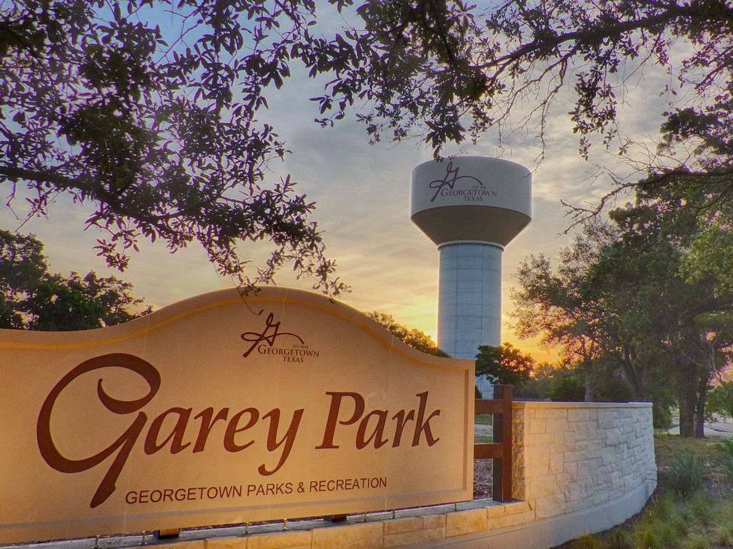5836 Sean Paul Lane Georgetown, TX 78628 - Photo 2 of 4 a sign board with a sign board