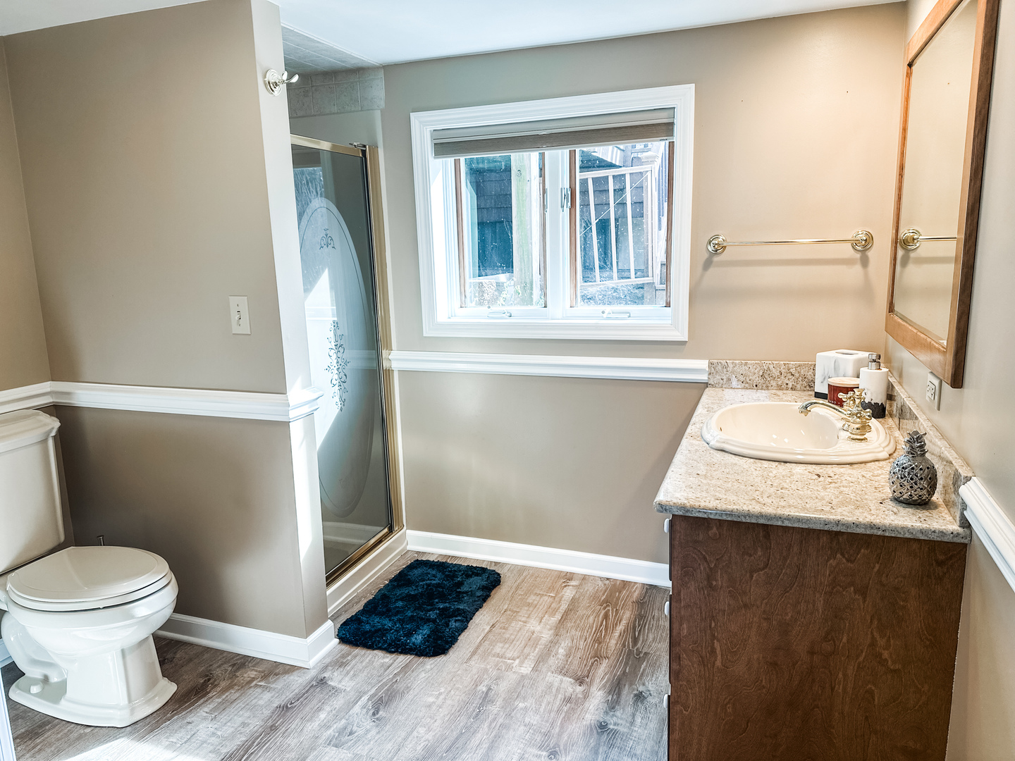 5341 Meadow Lane Lisle, IL 60532 - Photo 12 of 16 a bathroom with a sink and a toilet