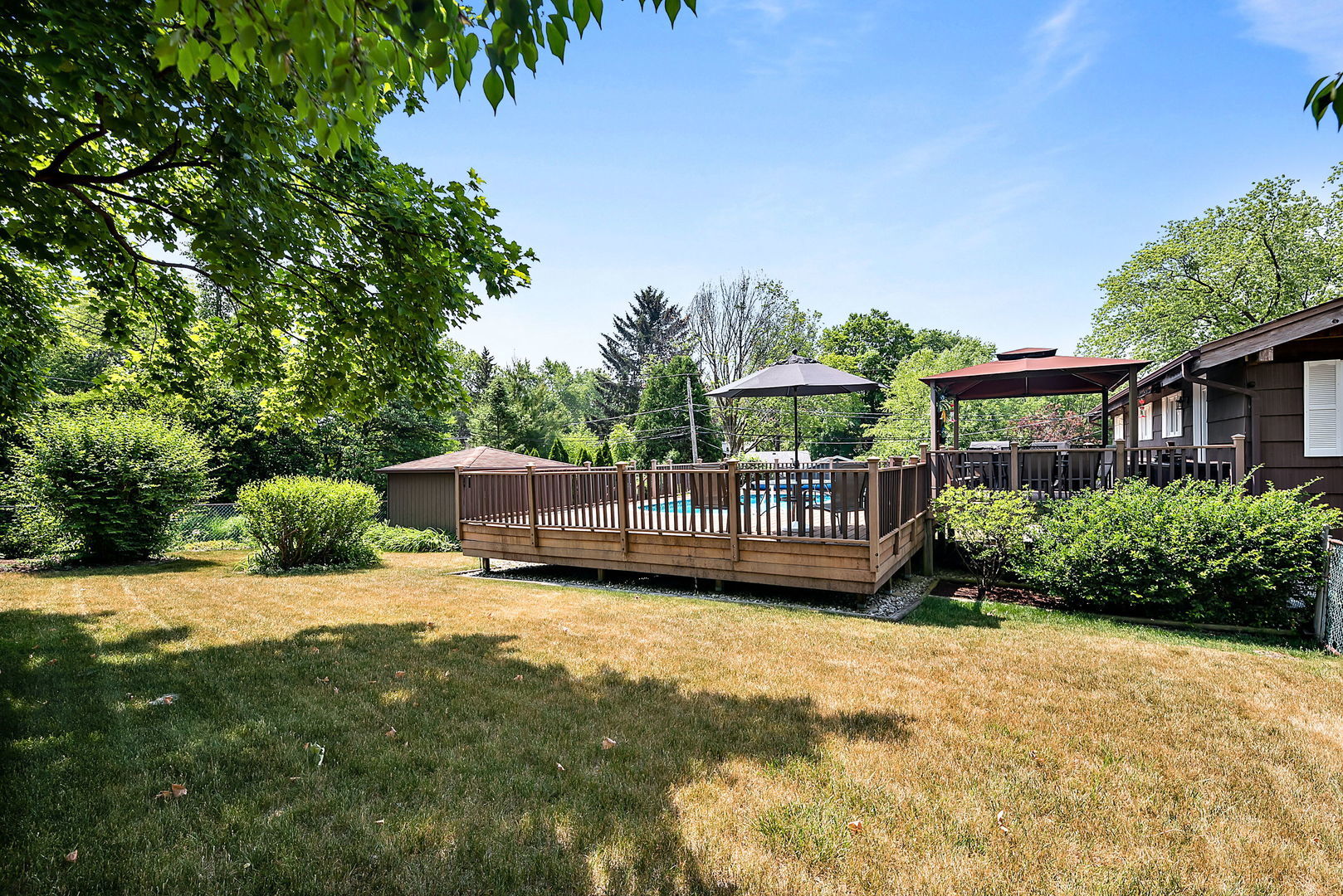5341 Meadow Lane Lisle, IL 60532 - Photo 16 of 16 a view of a house with a yard and sitting area
