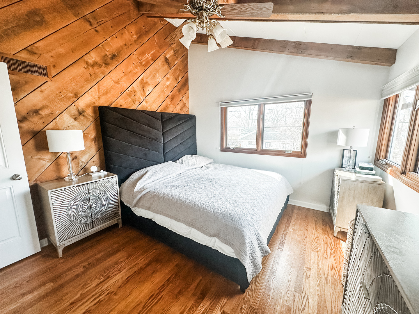 5341 Meadow Lane Lisle, IL 60532 - Photo 5 of 16 a bed sitting in a bedroom next to a window