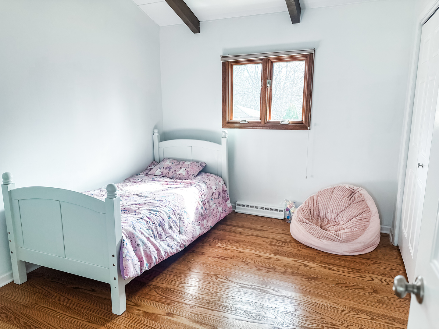 5341 Meadow Lane Lisle, IL 60532 - Photo 9 of 16 a bedroom with a bed and wooden floor