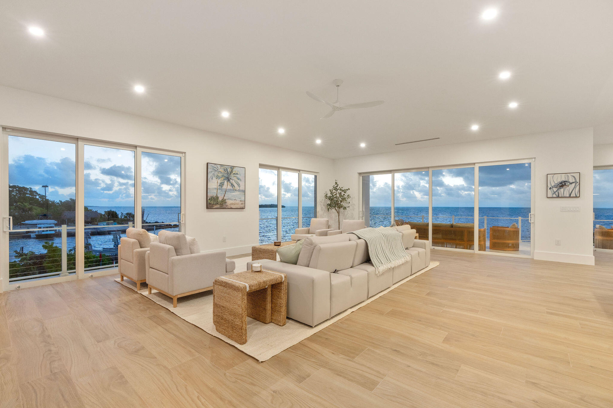 1002 Snapper Lane Key Largo, FL 33037 - Photo 5 of 106 a spacious bedroom with a large bed and a large window