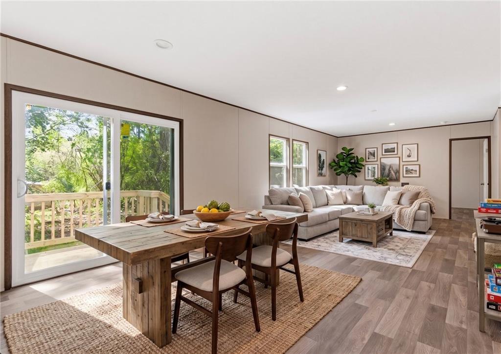 66 Martin Byers Road Dahlonega, GA 30533 - Photo 15 of 32 a living room with furniture and a large window