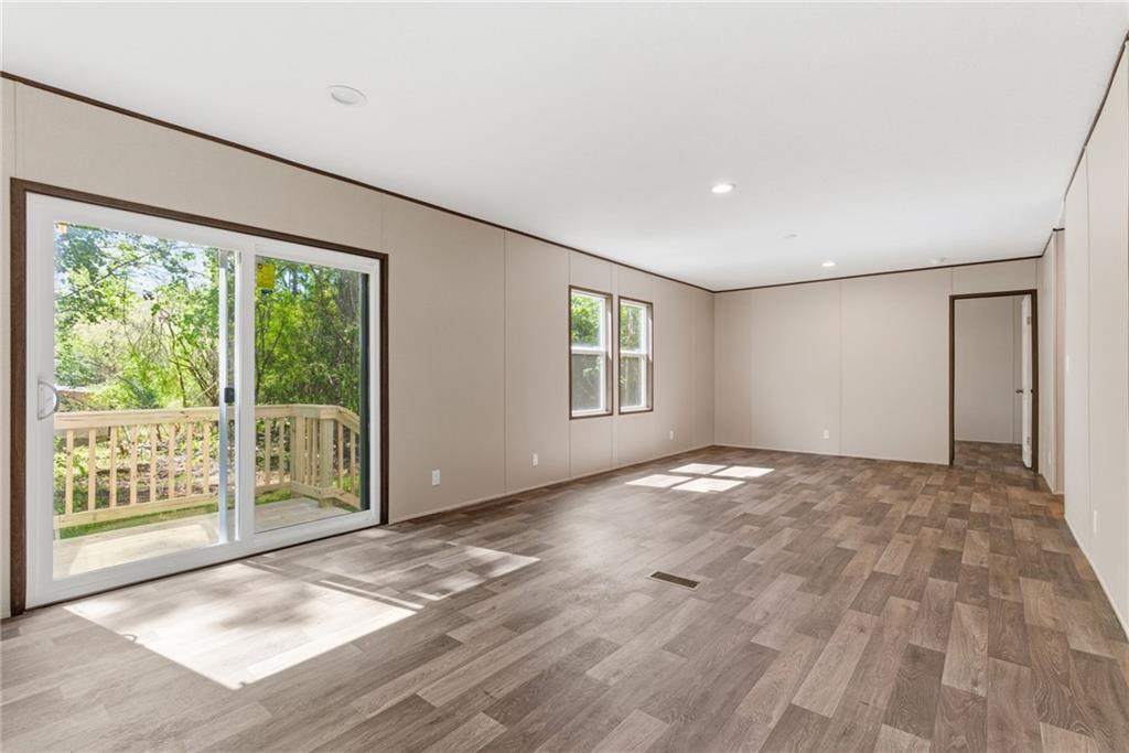 66 Martin Byers Road Dahlonega, GA 30533 - Photo 16 of 32 a view of an empty room with a window
