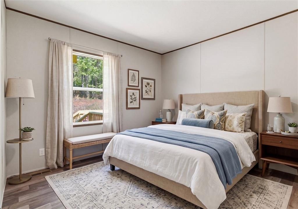 66 Martin Byers Road Dahlonega, GA 30533 - Photo 29 of 32 a bedroom with a bed and a window