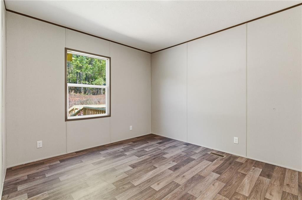 66 Martin Byers Road Dahlonega, GA 30533 - Photo 30 of 32 an empty room with a window