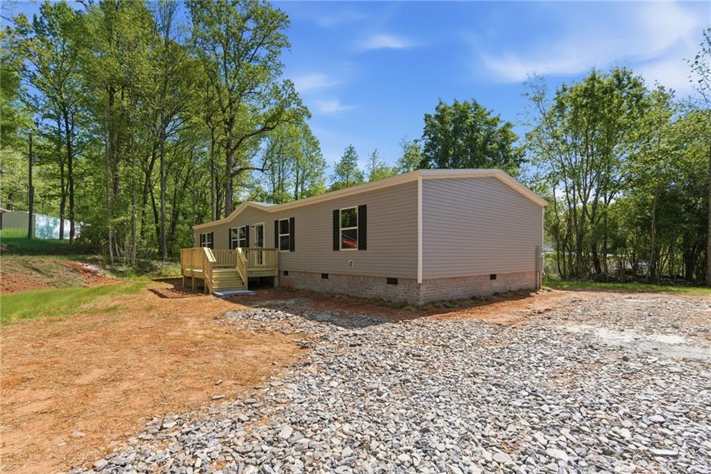 66 Martin Byers Road Dahlonega, GA 30533 - Photo 32 of 32 a view of a house with a yard