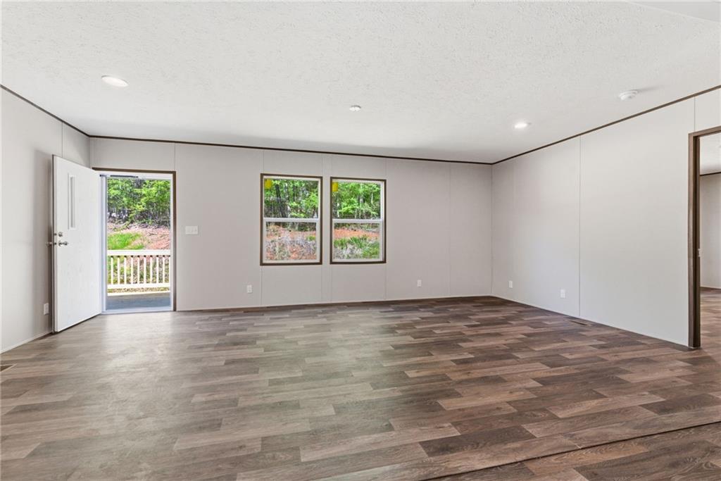 66 Martin Byers Road Dahlonega, GA 30533 - Photo 5 of 32 an empty room with windows