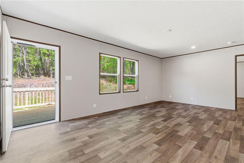 66 Martin Byers Road Dahlonega, GA 30533 - Photo 6 of 32 an empty room with large window