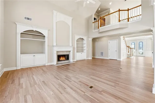 a view of a livingroom with wooden floor