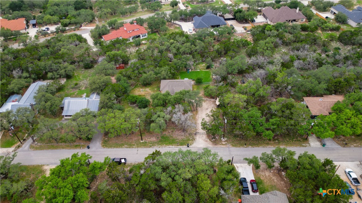 2216 Hornsby Spring Branch, TX 78070 - Photo 30 of 33 an aerial view of residential house with outdoor space and trees all around