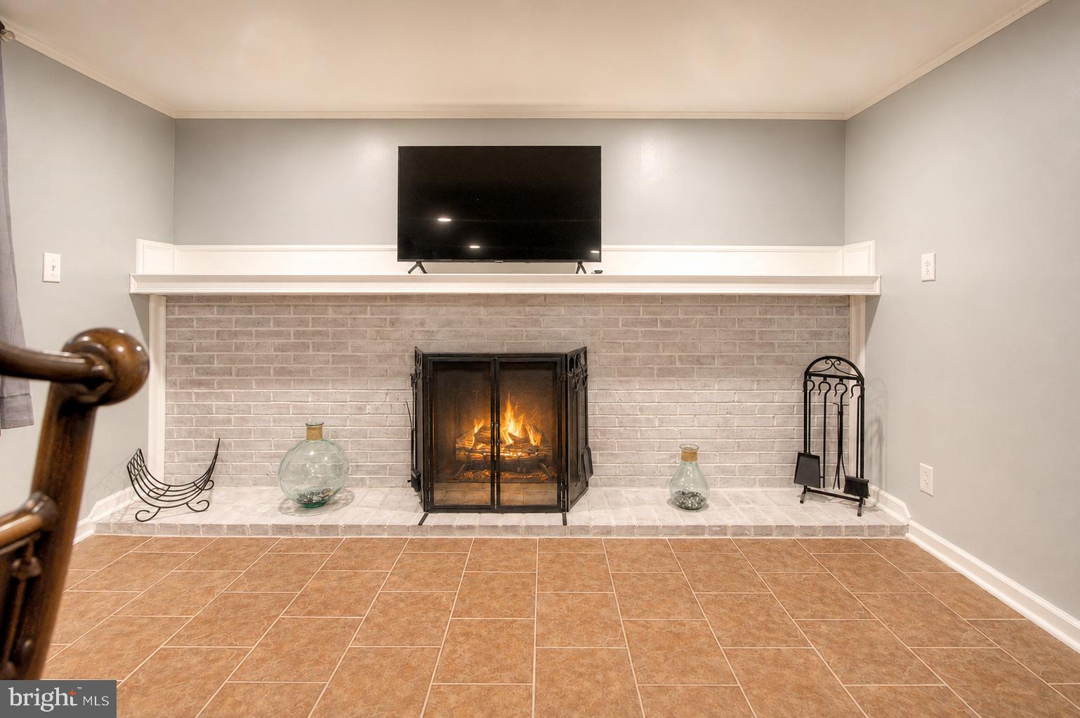 32 Bryant Road Turnersville, NJ 08012 - Photo 22 of 33 a living room with fireplace furniture and a flat screen tv