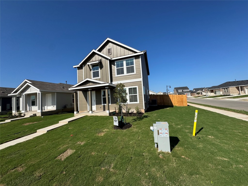 110 Haw Branch View Kyle, TX 78640 - Photo 1 of 15 View of front of property with a residential view, board and batten siding, and covered porch