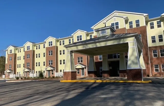a view of a building with a street