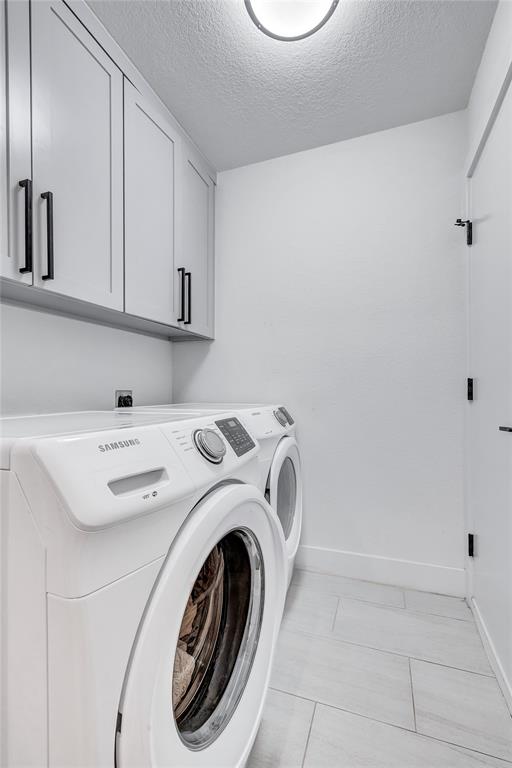 3600 Rip Ford Drive Austin, TX 78732 - Photo 28 of 32 a utility room with dryer and washer