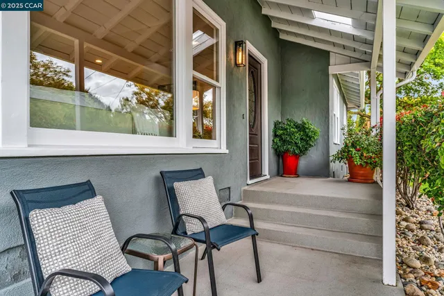 a view of chair and tables in patio