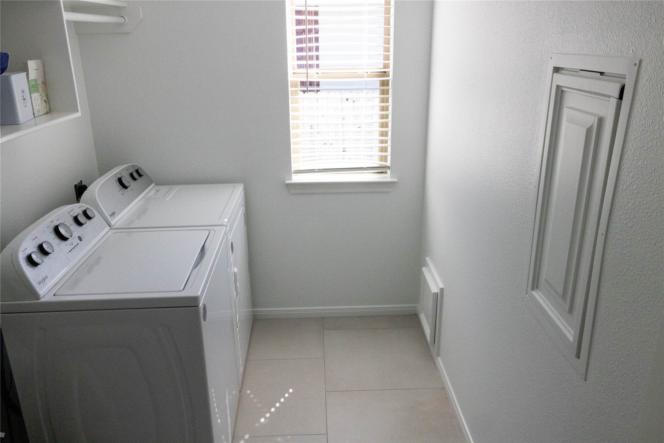 17023 Lexington Drive Conroe, TX 77385 - Photo 21 of 25 a utility room with dryer and washer