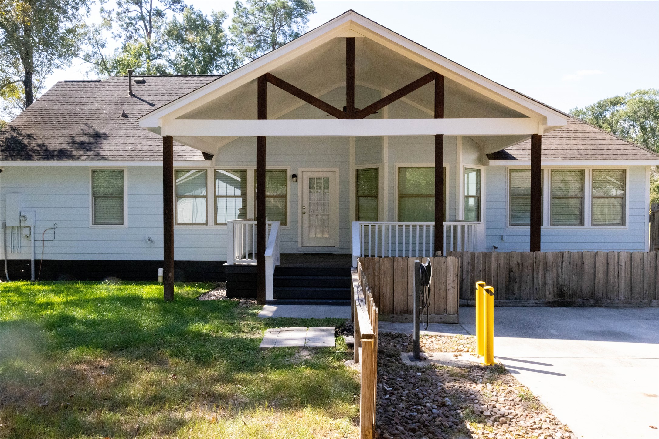 17023 Lexington Drive Conroe, TX 77385 - Photo 24 of 25 a front view of a house with garden
