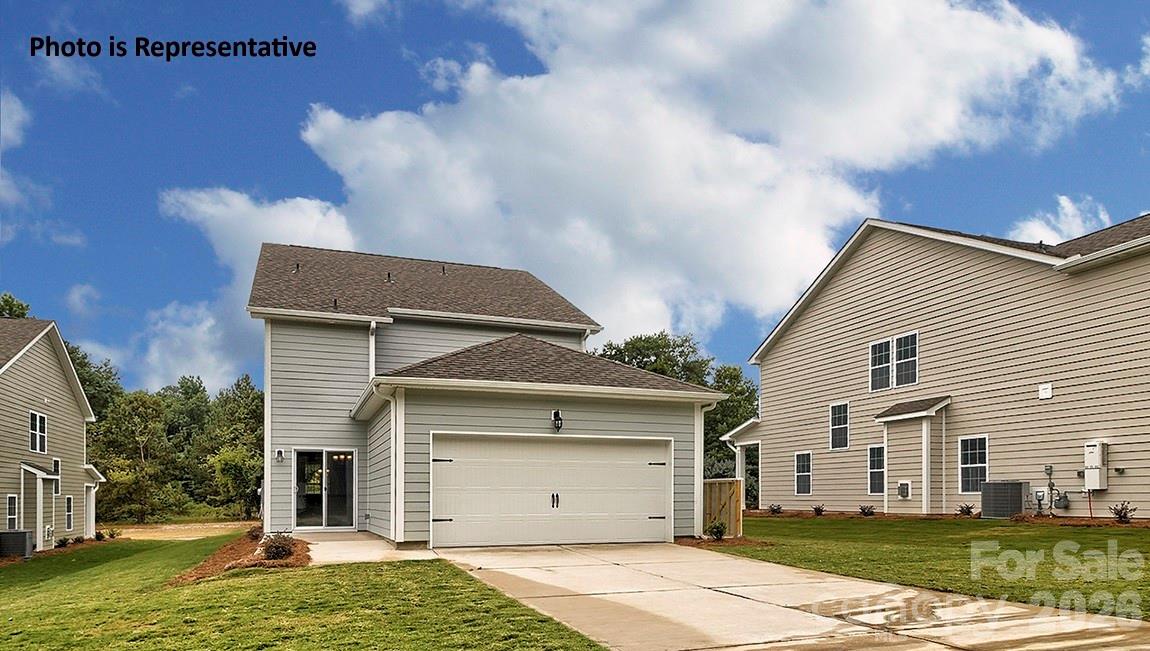 8909 Overhill Road Huntersville, NC 28078 - Photo 8 of 8 a house view with a garden space