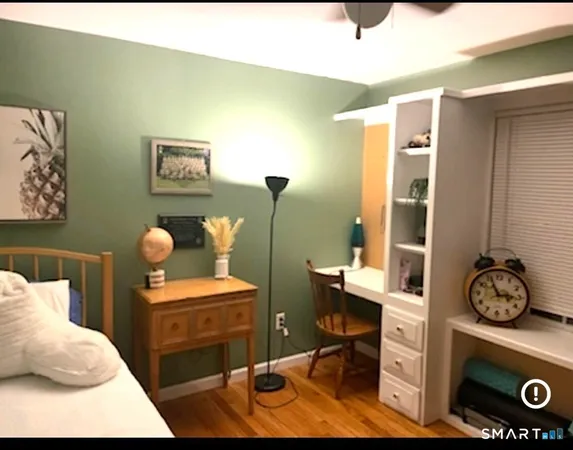 a bathroom with a sink toilet and mirror