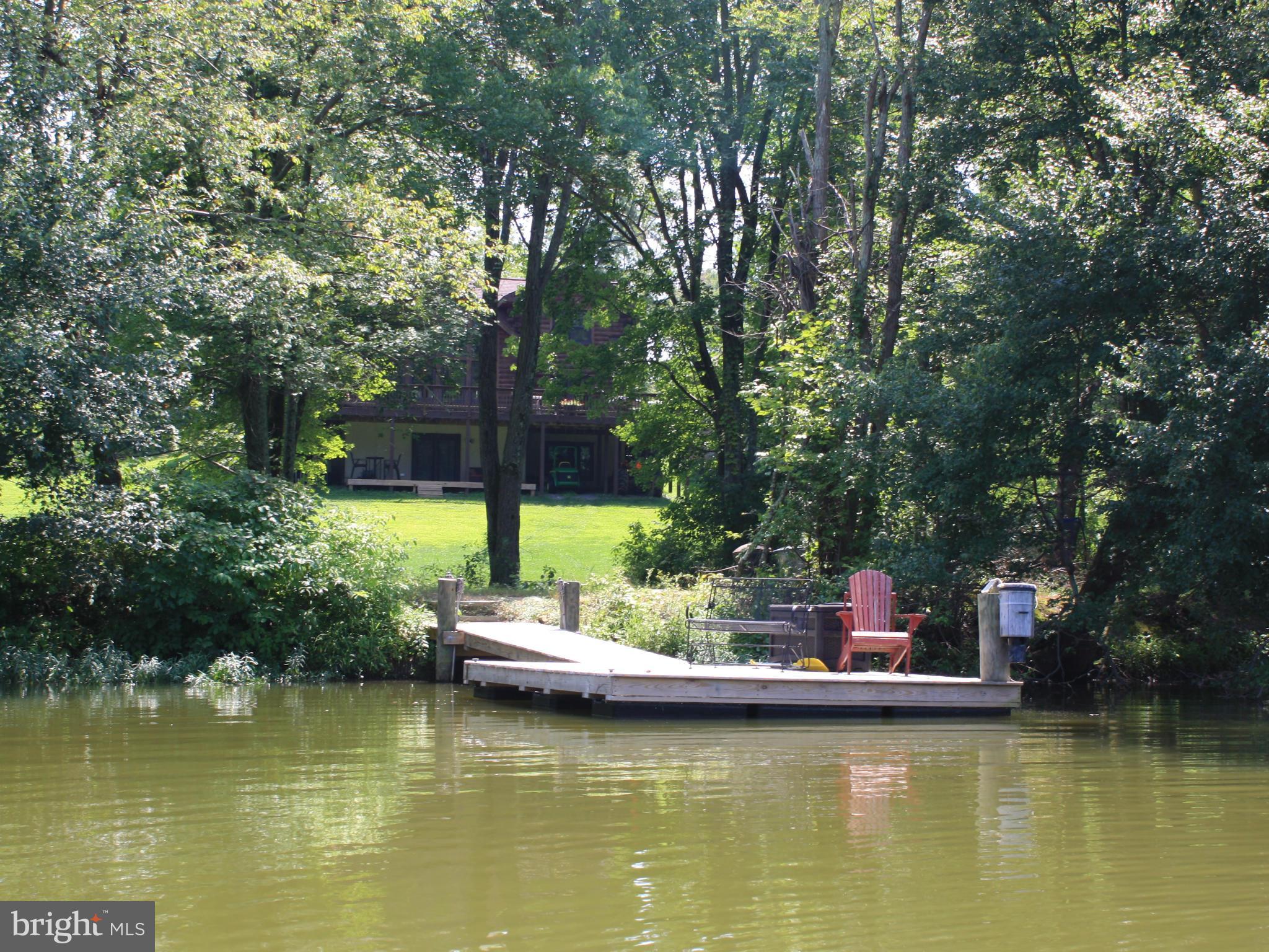 13121 Sagle Road Purcellville, VA 20132 - Photo 1 of 30 View of back of home from private lake