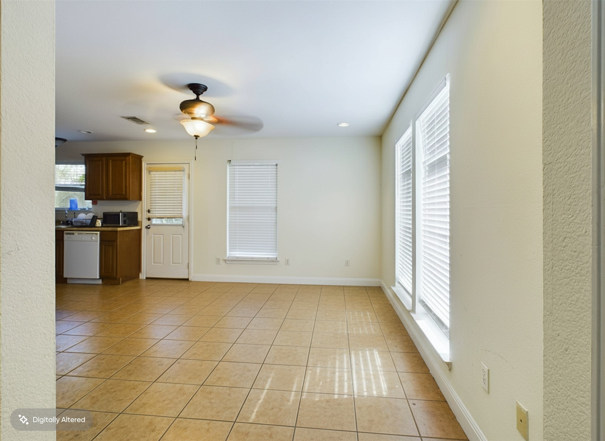 500 East 48th Street, Unit A Austin, TX 78751 - Photo 4 of 27 a view of a room with a flat screen tv and stainless steel appliances