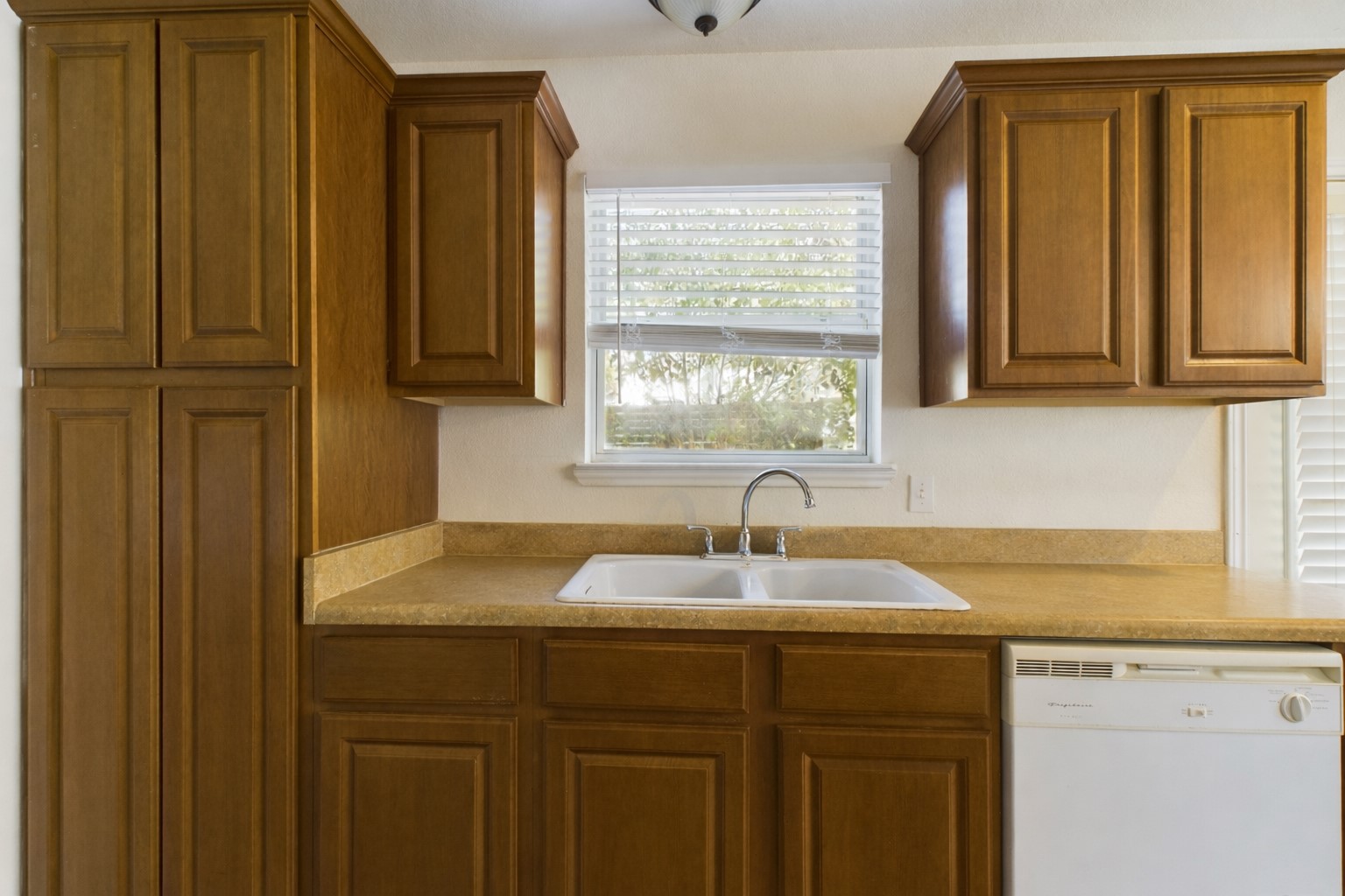 500 East 48th Street, Unit A Austin, TX 78751 - Photo 6 of 27 a kitchen with a sink cabinets and a window