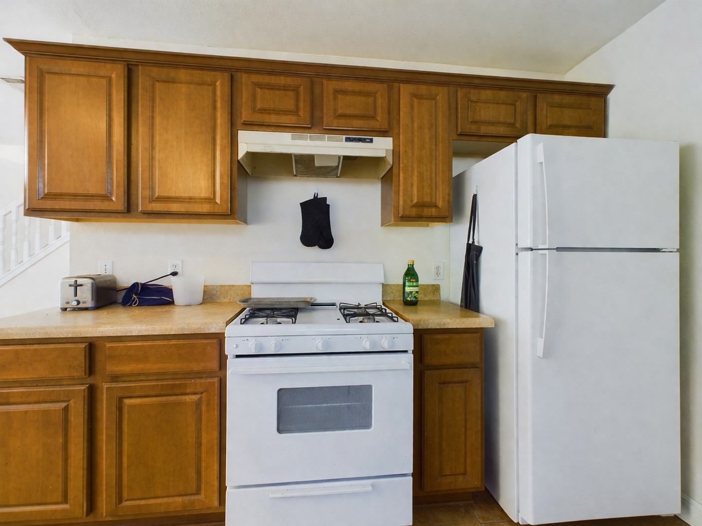 500 East 48th Street, Unit A Austin, TX 78751 - Photo 7 of 27 a white refrigerator freezer sitting inside of a kitchen
