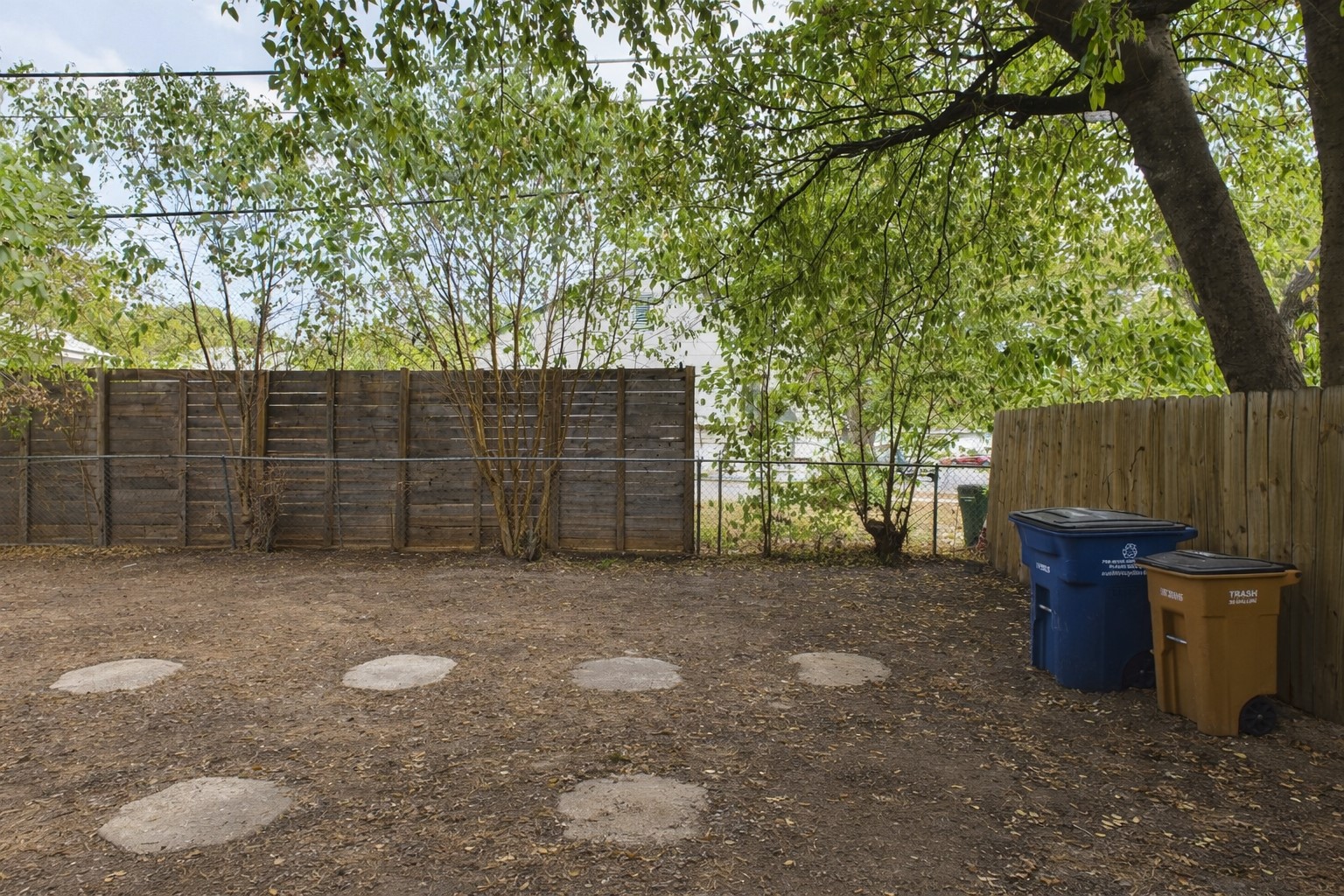 500 East 48th Street, Unit A Austin, TX 78751 - Photo 9 of 27 a backyard of a house with lots of green space
