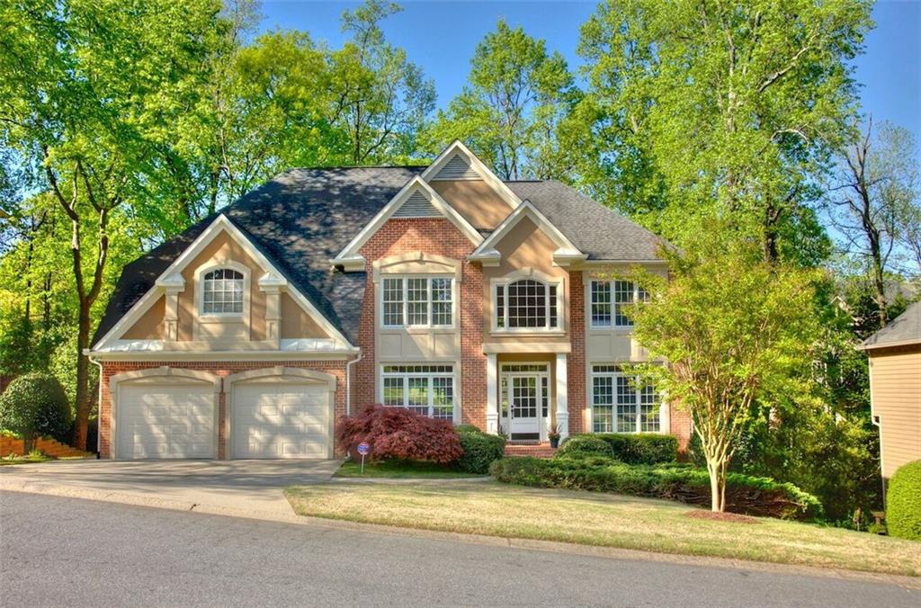 4548 Rutherford Drive Marietta, GA 30062 - Photo 1 of 1 4548 Rutherford Dr-Three finished levels on beautiful lot, walking distance to pool, tennis courts, playground and even The Avenue shopping center.