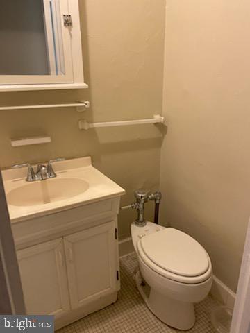 2031 Locust Street, Unit 103 Philadelphia, PA 19103 - Photo 5 of 16 a bathroom with a sink and a toilet