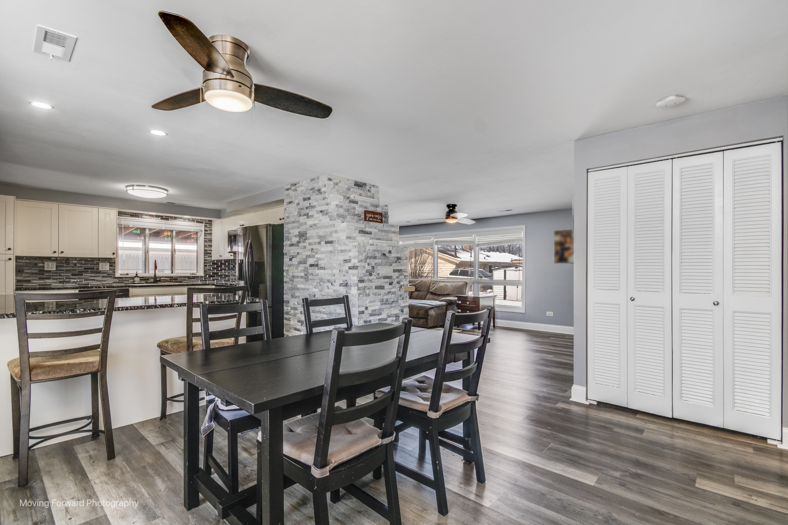 214 Springinsguth Road Schaumburg, IL 60193 - Photo 2 of 29 a view of a dining room with furniture and wooden floor