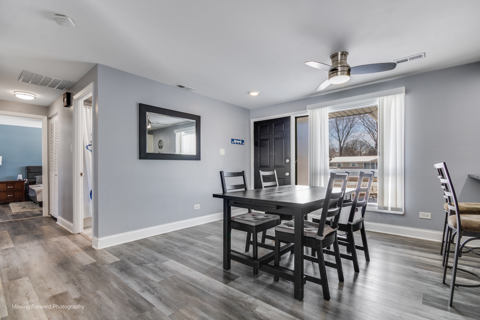 214 Springinsguth Road Schaumburg, IL 60193 - Photo 22 of 29 a view of a dining room with furniture window and wooden floor