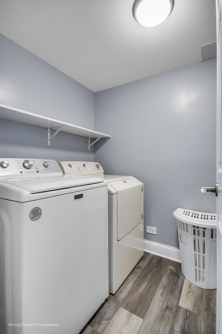 214 Springinsguth Road Schaumburg, IL 60193 - Photo 23 of 29 a utility room with dryer and washer