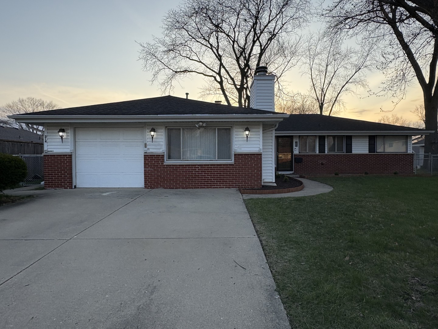 214 Springinsguth Road Schaumburg, IL 60193 - Photo 29 of 29 a house view with a garden space