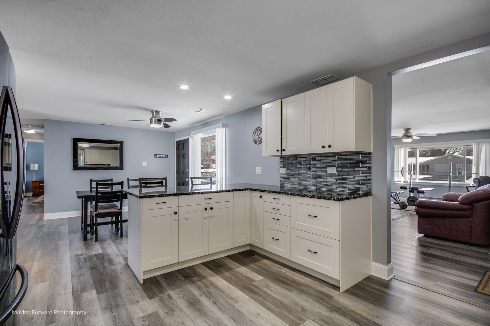 214 Springinsguth Road Schaumburg, IL 60193 - Photo 8 of 29 a kitchen with granite countertop a sink stove and cabinets