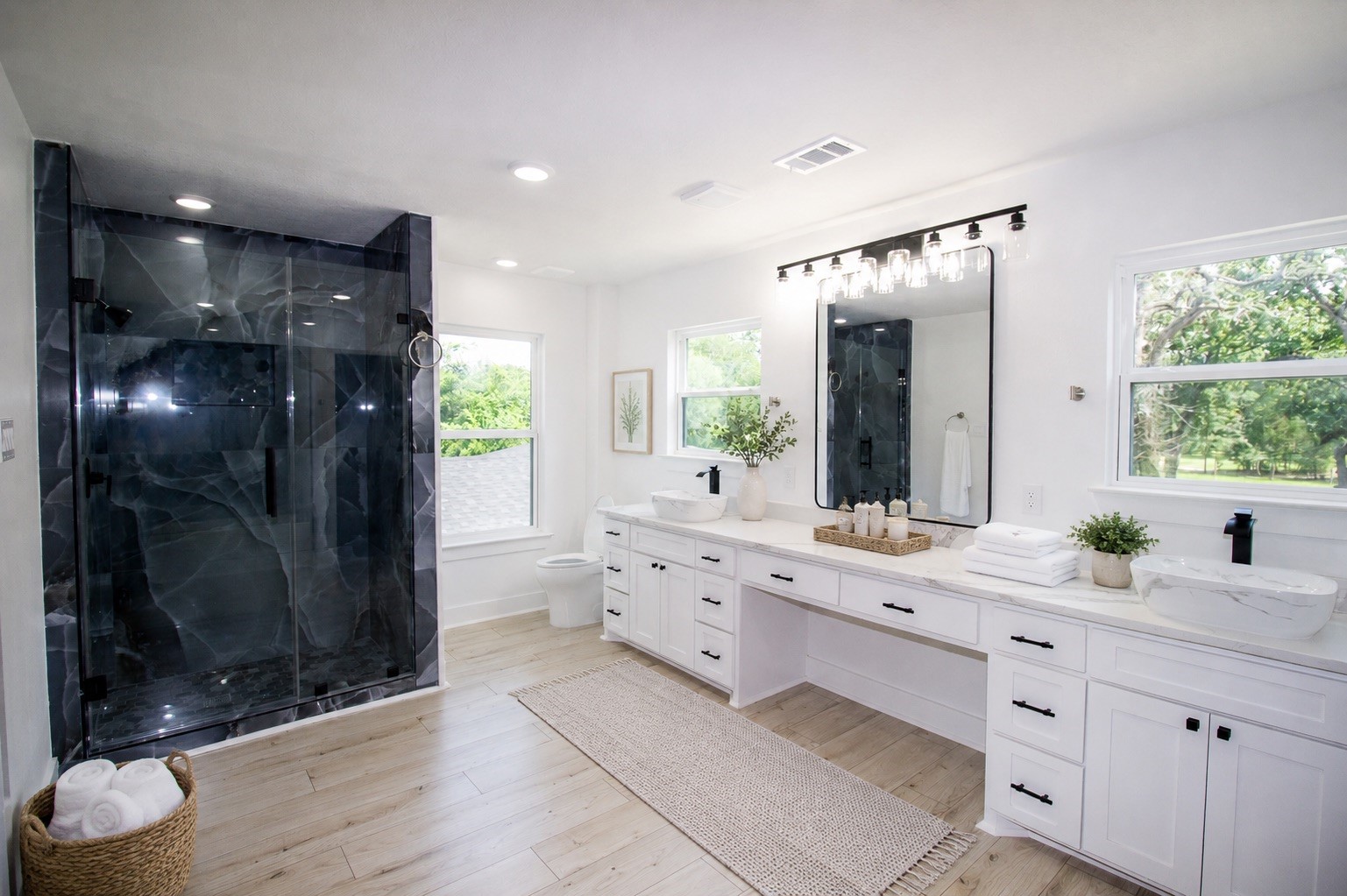 54 Windmill Road Hempstead, TX 77445 - Photo 15 of 26 a bathroom with a sink a toilet a large mirror and shower
