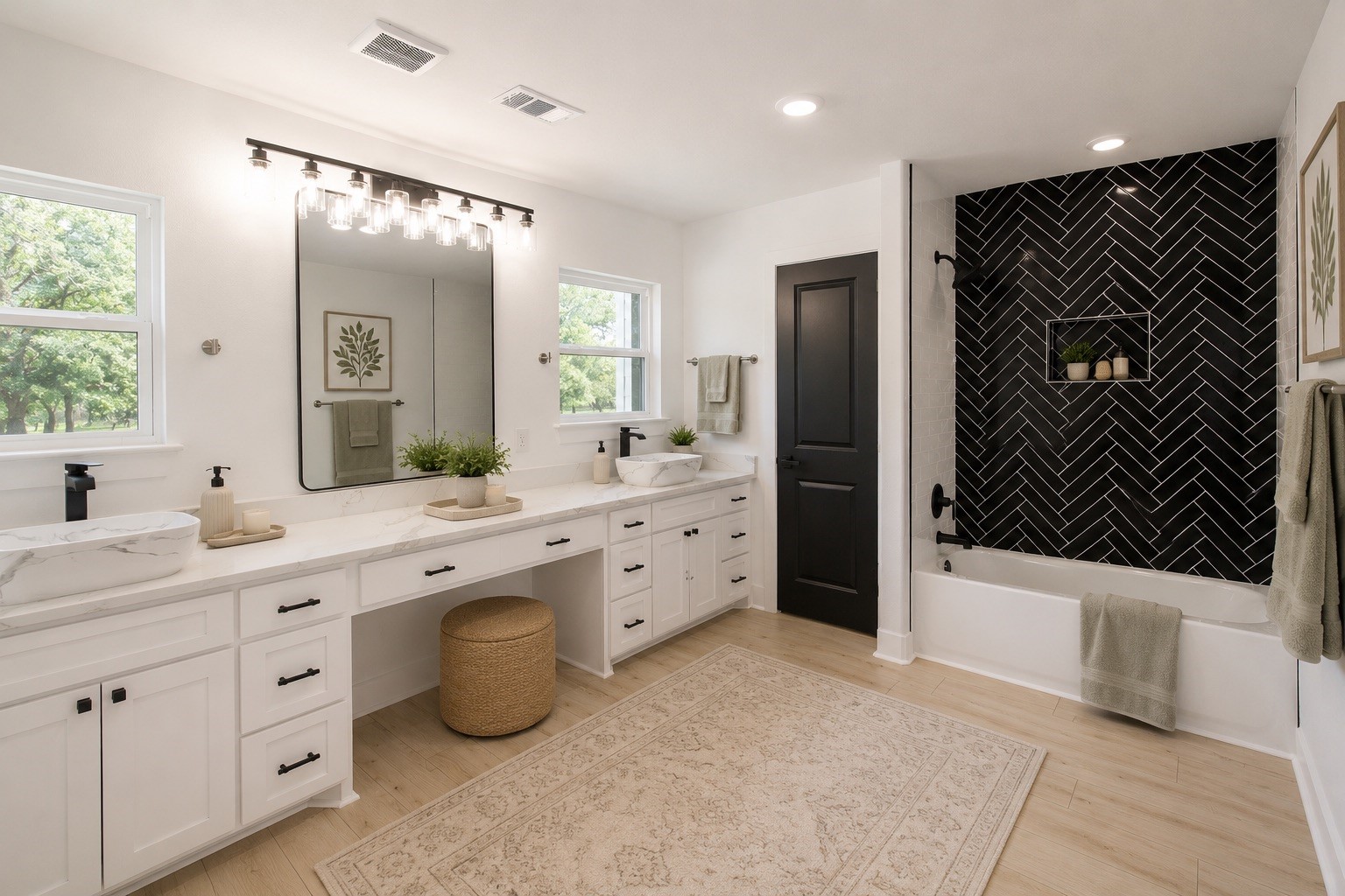 54 Windmill Road Hempstead, TX 77445 - Photo 16 of 26 a spacious bathroom with a double vanity sink a large mirror and a bathtub