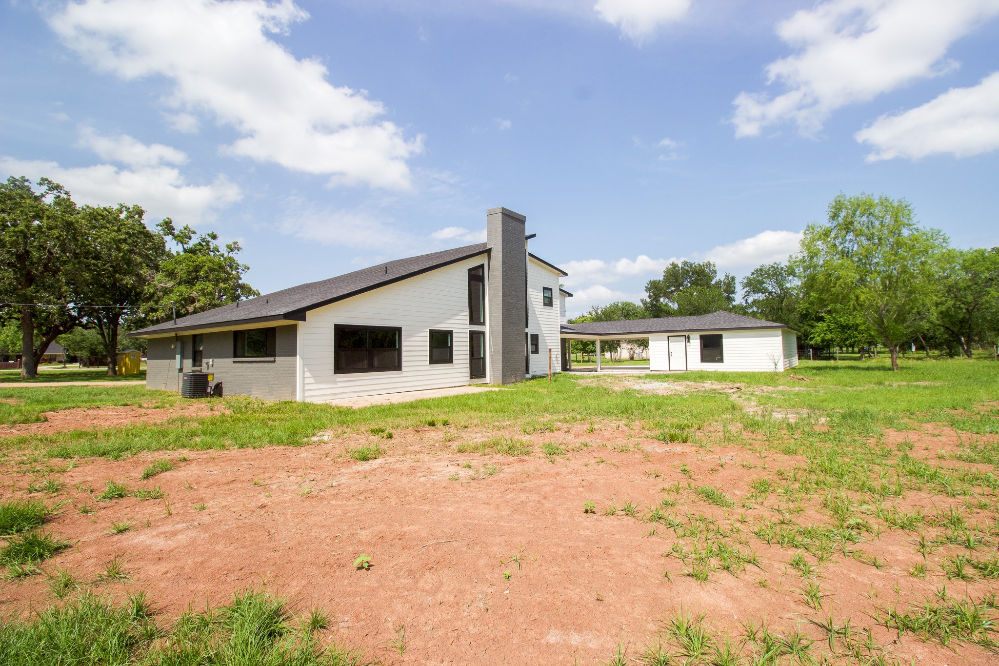 54 Windmill Road Hempstead, TX 77445 - Photo 22 of 26 a front view of a house with a yard