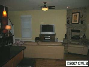 118 Mills Lane Fort Mill, SC 29708 - Photo 3 of 8 a kitchen with a sink and a stove top oven