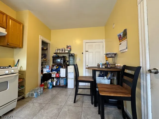 a view of a workspace with furniture