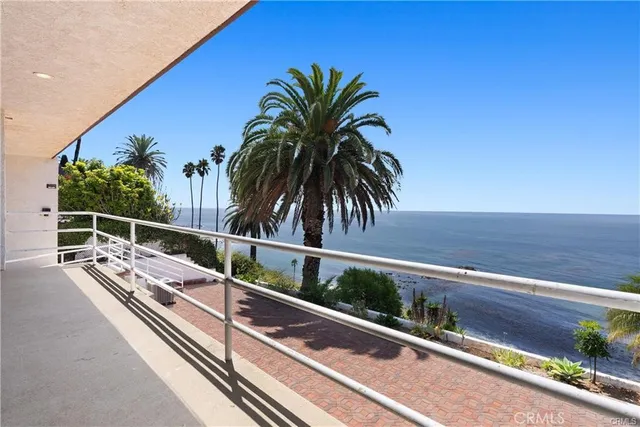a view of balcony with furniture