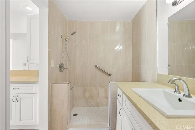 a bathroom with a bathtub and a sink