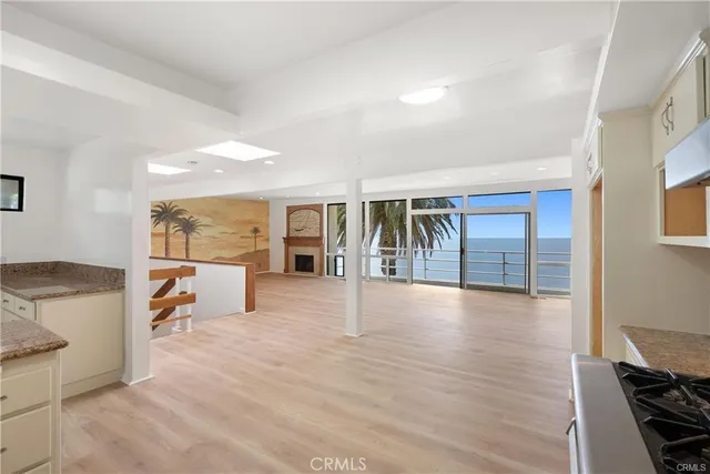 a view of a living room filled with furniture