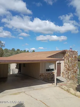 a view of a house with a patio