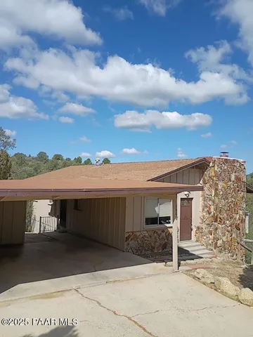 a view of a house with a patio