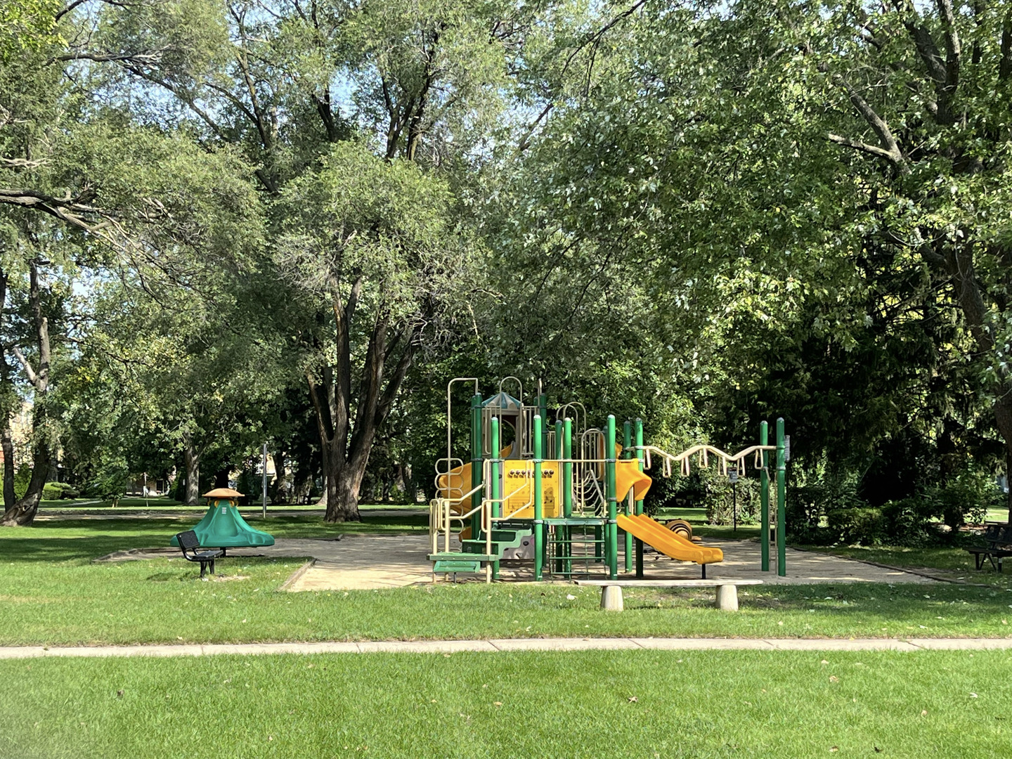 736 Dempster Street, Unit 110 Mount Prospect, IL 60056 - Photo 16 of 20 a view of a park with slide