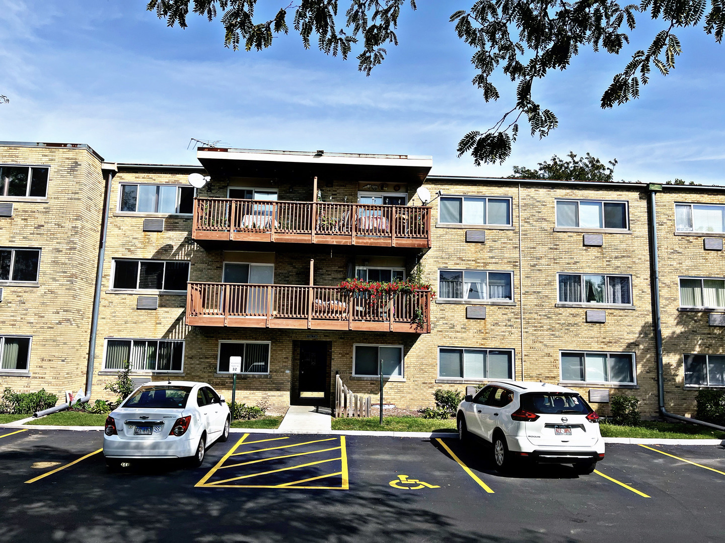 736 Dempster Street, Unit 110 Mount Prospect, IL 60056 - Photo 20 of 20 a car parked in front of a building